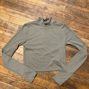Tight green ribbed long sleeve shirt from forever 21, size medium.